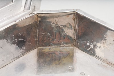 Lot 577 - A pair of Charles II sterling silver chinoiserie toilet caskets, London 1683 by Ralph Leake (free 1671)