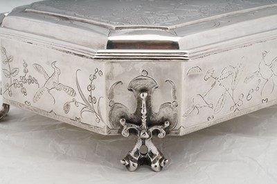 Lot 577 - A pair of Charles II sterling silver chinoiserie toilet caskets, London 1683 by Ralph Leake (free 1671)