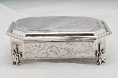 Lot 577 - A pair of Charles II sterling silver chinoiserie toilet caskets, London 1683 by Ralph Leake (free 1671)