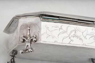 Lot 577 - A pair of Charles II sterling silver chinoiserie toilet caskets, London 1683 by Ralph Leake (free 1671)