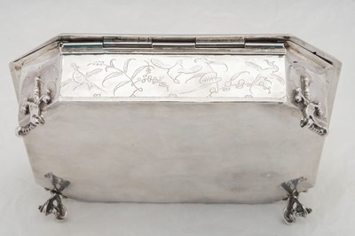 Lot 577 - A pair of Charles II sterling silver chinoiserie toilet caskets, London 1683 by Ralph Leake (free 1671)