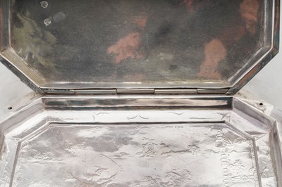 Lot 577 - A pair of Charles II sterling silver chinoiserie toilet caskets, London 1683 by Ralph Leake (free 1671)