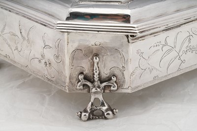 Lot 577 - A pair of Charles II sterling silver chinoiserie toilet caskets, London 1683 by Ralph Leake (free 1671)