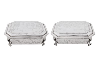 Lot 577 - A pair of Charles II sterling silver chinoiserie toilet caskets, London 1683 by Ralph Leake (free 1671)