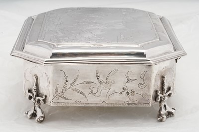 Lot 577 - A pair of Charles II sterling silver chinoiserie toilet caskets, London 1683 by Ralph Leake (free 1671)