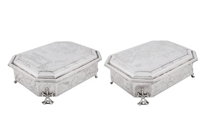 Lot 577 - A pair of Charles II sterling silver chinoiserie toilet caskets, London 1683 by Ralph Leake (free 1671)