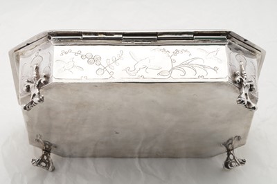 Lot 577 - A pair of Charles II sterling silver chinoiserie toilet caskets, London 1683 by Ralph Leake (free 1671)