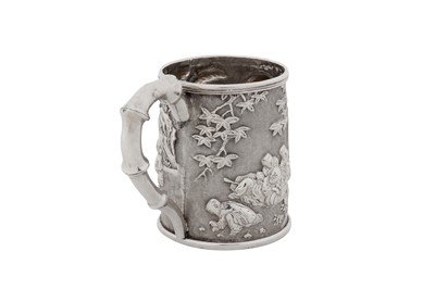 Lot 254 - An early 20th century Chinese export silver christening mug, Canton circa 1910, marked Xie Chang, retailed by Tuck Chang of Shanghai