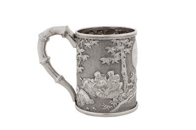 Lot 254 - An early 20th century Chinese export silver christening mug, Canton circa 1910, marked Xie Chang, retailed by Tuck Chang of Shanghai