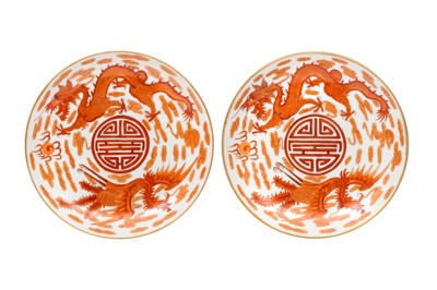 Lot 228 - A PAIR OF CHINESE IRON-RED 'DRAGON AND PHOENIX' DISHES