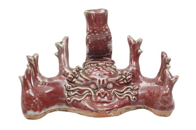 Lot 324 - A LARGE CHINESE COPPER RED-GLAZED BRUSH REST