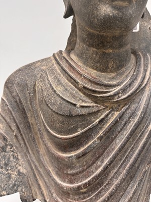 Lot 196 - A LARGE CARVED GANDHARA GREY SCHIST BUST OF THE HISTORICAL BUDDHA, SIDDHARTHA GAUTAMA SHAKYAMUNI