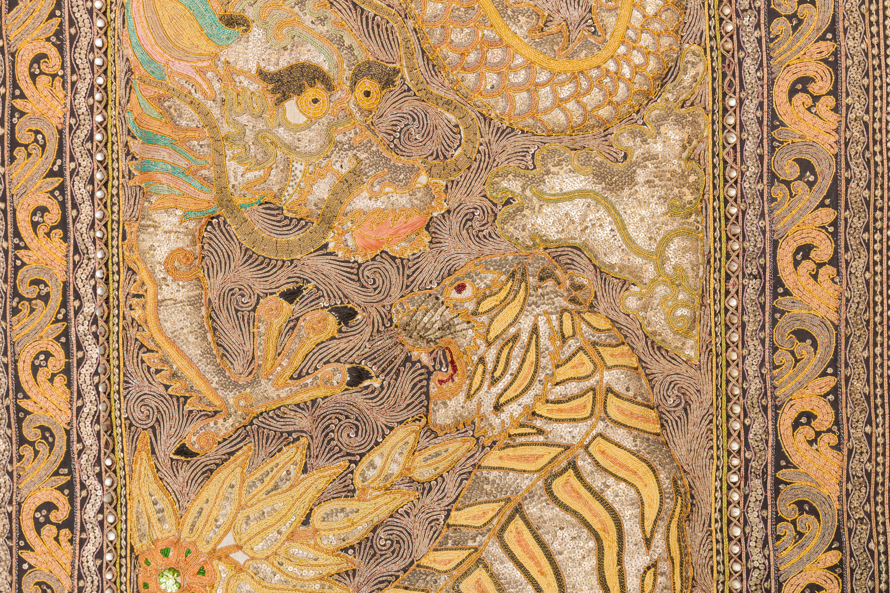 Lot 415 - A LARGE KALAGA EMBROIDERED AND BEADED