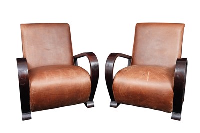 Lot 265 - A PAIR OF GENERAL TRADING COMPANY HALABALA STYLE BROWN LEATHER UPHOLSTERED ARMCHAIRS