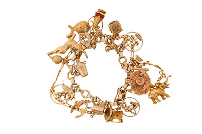 Lot 388 - A CHARM BRACELET