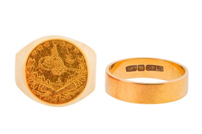 Lot 22 - A KURUSH COIN RING AND A BAND