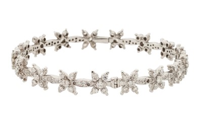 Lot 389 - A DIAMOND BANGLE