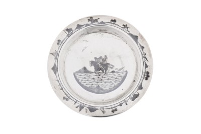 Lot 321 - An early 20th century Iraqi silver and niello coaster or dish, Omara circa 1920, signed Baqqal and Abbas