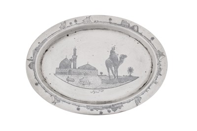 Lot 320 - An early to mid-20th century Iraqi silver and niello small tray, Omara dated 1930, signed Hantoush