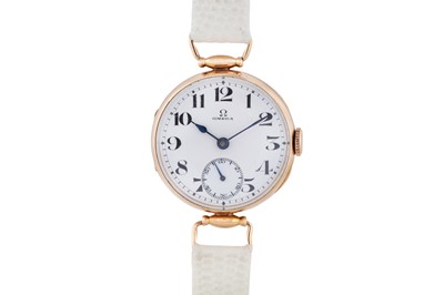 Lot 261 - A GOLD OMEGA TRANSITIONAL WRISTWATCH