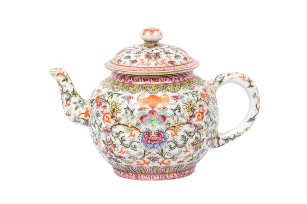 Lot 584 - A CHINESE FAMILLE-ROSE WHITE-GROUND TEAPOT AND COVER