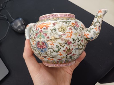 Lot 584 - A CHINESE FAMILLE-ROSE WHITE-GROUND TEAPOT AND COVER