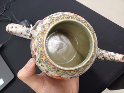 Lot 584 - A CHINESE FAMILLE-ROSE WHITE-GROUND TEAPOT AND COVER