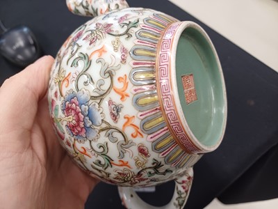 Lot 584 - A CHINESE FAMILLE-ROSE WHITE-GROUND TEAPOT AND COVER