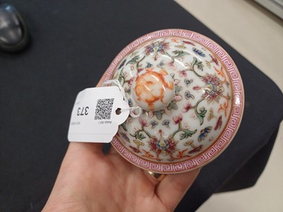Lot 584 - A CHINESE FAMILLE-ROSE WHITE-GROUND TEAPOT AND COVER