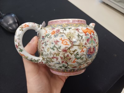 Lot 584 - A CHINESE FAMILLE-ROSE WHITE-GROUND TEAPOT AND COVER