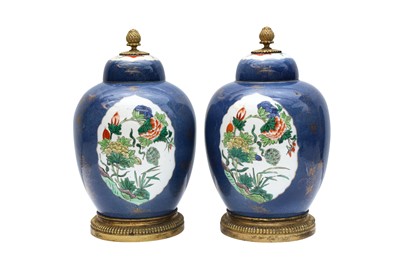 Lot 101 - A PAIR OF CHINESE FAMILLE-VERTE POWDER-BLUE JARS WITH GILT-METAL MOUNTS