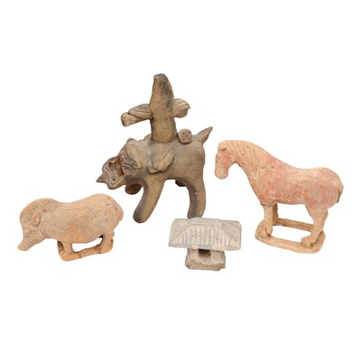 Lot 634 - A group of Chinese pottery figures, Han dynasty