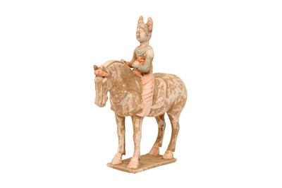 Lot 461 - A CHINESE PAINTED POTTERY FIGURE OF A POLO PLAYER