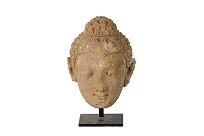 Lot 26 - A SANDSTONE HEAD OF BUDDHA