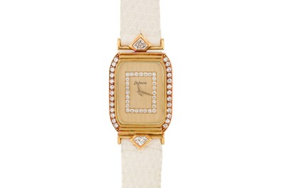 Lot 249 - A LADY'S DeLANEAU GOLD AND DIAMOND-SET DRESS WATCH