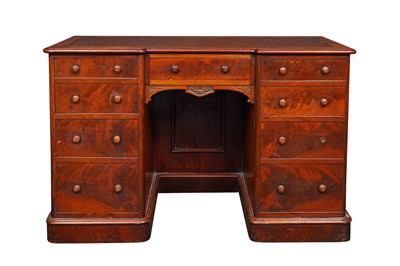 Lot 362 - A LATE VICTORIAN MAHOGANY INVERTED BREAKFRONT KNEEHOLE DESK