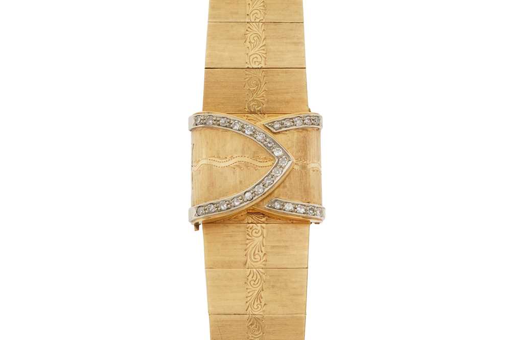 Lot 273 - A LADY'S GOLD AND DIAMOND-SET BRACELET WATCH