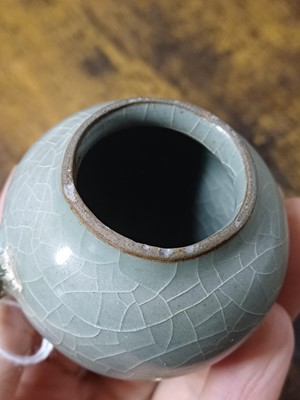 Lot 291 - A CHINESE LONGQUAN CELADON-GLAZED BIRD FEEDER