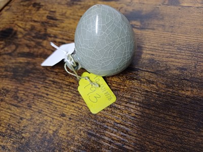 Lot 291 - A CHINESE LONGQUAN CELADON-GLAZED BIRD FEEDER