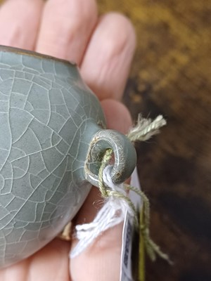 Lot 291 - A CHINESE LONGQUAN CELADON-GLAZED BIRD FEEDER