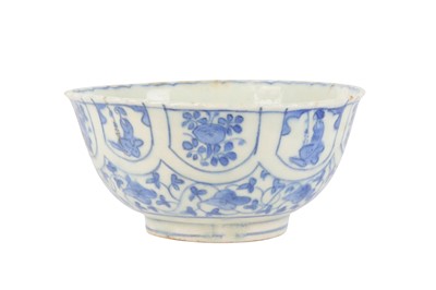 Lot 123 - THREE ASIAN-INSPIRED BLUE AND WHITE POTTERY DISHES WITH FIGURAL AND VEGETAL MOTIFS