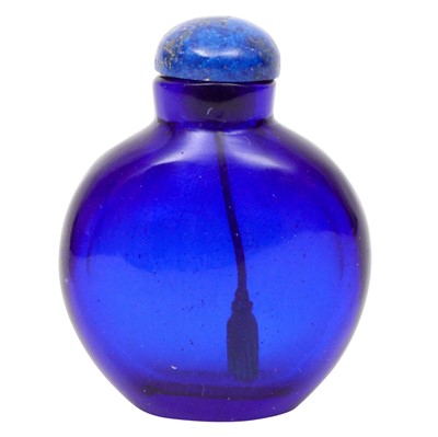 Lot 716 - A Chinese dark blue glass snuff bottle, 19th century