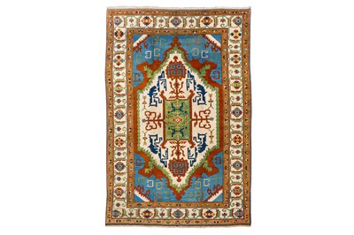 Lot 5 - A FINE TURKISH CARPET OF STYLISED DRAGON DESIGN