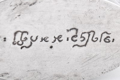 Lot 219 - An early 20th century Burmese unmarked silver lime box, Shan States dated 1914