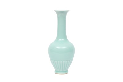 Lot 611 - A CHINESE CELADON-GLAZED 'PETAL' VASE