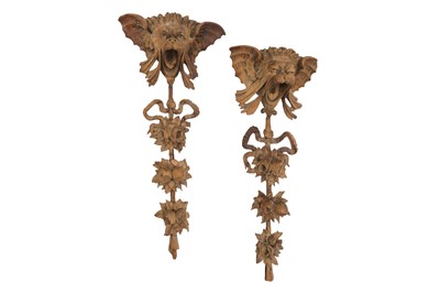 Lot 347 - A PAIR OF CARVED PINE WALL BRACKETT IN THE FORM OF MYTHICAL CREATURES