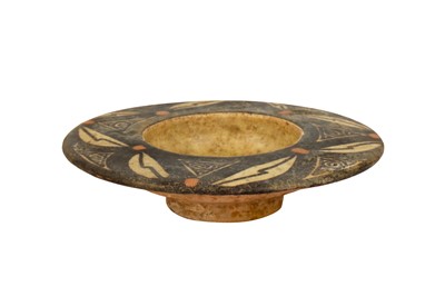Lot 39 - A SMALL NISHAPUR POTTERY FOOTED DISH