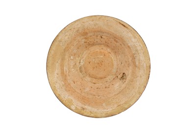 Lot 39 - A SMALL NISHAPUR POTTERY FOOTED DISH