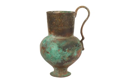 Lot 30 - AN ENGRAVED BRONZE JUG