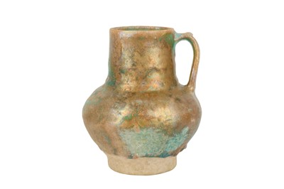 Lot 28 - A TURQUOISE GLAZED POTTERY JUG WITH IRIDESCENCE